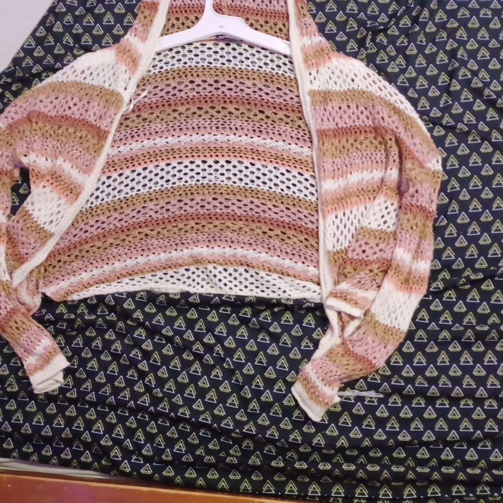 I honestly don't know but I think its a cardigan